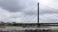 Dusseldorf, Germany - February 20, 2020: view of the Rhine river, promenade and bridge. View over a walk on the banks of the Rhine Royalty Free Stock Photo