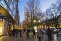 KÃÂ¶nigsallee Royal Allee in DÃÂ¼sseldorf - illuminated at dusk and full of famous brand boutiques