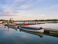 Dusseldorf, Germany - Peaceful evening at Lake Unterbacher See. Moored pedalos nad kayaks for rent. Beautiful landscape Royalty Free Stock Photo