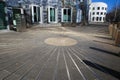 View over square with circle and symmetrical lines on Gehry house