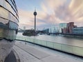 Dusseldorf skyline during sunrise. View of the Rheinturm tower, the marina and the media harbor