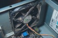 Dust on computer pc processor cooler with mainboard and computer case fragment