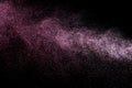 Dust explosion on a black background for graphic resources.