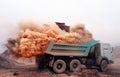 Dust explosion when loading truck at the mine Royalty Free Stock Photo