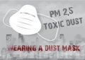 Dust mask with warning wording about PM 2.5 dust on landscape city view in dust and bad fog pollution