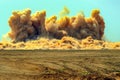 Dust storm after detonator blasting in the Arabian desert