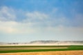 Dust storm in dry fields, dry weather infuenced by climate change Royalty Free Stock Photo