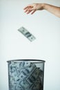 Dustbin, money or bills with finance, inflation or debt with bankruptcy, trash or global recession. Waste bucket, cash Royalty Free Stock Photo