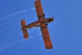 Duster airplane on clear blue sky bottom view Royalty Free Stock Photo