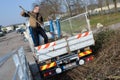 dustman cleaning lorry bin