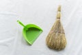 Dustpan and broom . cleaning after repairs. cleaning services Royalty Free Stock Photo