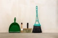 dustpan brush and metal for cleaning the room against the wall