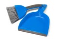 Dustpan and Small Broom Used for Cleaning on a White Background