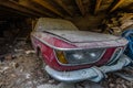 abandoned red BMW car in wood stadl Royalty Free Stock Photo