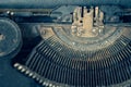 Dusty antique typewriter with focus on the type guide sitting to the right