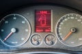 Dusty car dashboard panel with speedometer and, open door indicator isolated