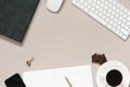 Dusty coffee office Desk with a computer, a diary with a pen, a Cup of coffee with chocolate pieces, a phone. Top view with copy Royalty Free Stock Photo