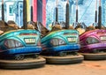 Dusty colored electric bumper cars or dodgem cars parked Royalty Free Stock Photo