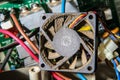 Dusty computer cooling system fan close-up. Royalty Free Stock Photo