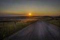 Dusty dirt road sunset in rural America