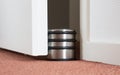 Dusty doorstop in a modern house Royalty Free Stock Photo