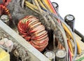 Dusty ferrite ring on circuit board, Close up Royalty Free Stock Photo