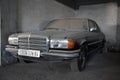 Dusty forgotten classic mercedes-benz w201 in garage in Algiers, Algeria, November 12, 2017