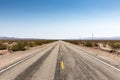 dusty highway route 66 leads through the mojave desert, California, USA Royalty Free Stock Photo