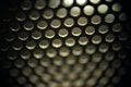 Metal round grill in macro, mesh background Royalty Free Stock Photo