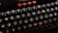 Dusty old typewriter keyboard with round keys Royalty Free Stock Photo