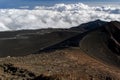 A dusty path between the lava craters of the Etna volcano