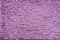 Dusty pink crinkled fabric texture