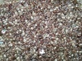 Dusty pink sequin mounds background