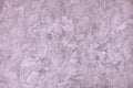 Dusty rose background, textured plastered wall, empty for isolates or text.