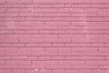 Dusty rose colored painted brick wall, creative copy space