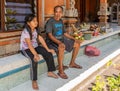 Father and daughter at family compound, Dusun Ambengan, Bali Indonesia