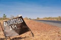 DUTABULU, GAMBIA - CIRCA MARCH, 2017: The Dutabulu road sign gives hope after long commute in the hot sun Royalty Free Stock Photo