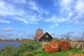 Dutch authentic village on water canal. Netherlands beautiful country landscape Royalty Free Stock Photo