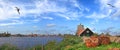 Dutch authentic village on water canal. Netherlands beautiful country landscape Royalty Free Stock Photo