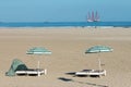 Dutch beach with heavy industry barge off the coast Royalty Free Stock Photo