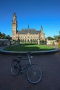 Dutch bicycle in front the Peace Palace, Vredespaleis, under a pure gradient blue sky
