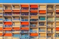 Dutch block of flats with orange sunshades Royalty Free Stock Photo