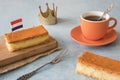 Orange tompouce, trditional Dutch treat with pudding and frosting on national holiday Kings Day April 27th, in The Netherlands. Royalty Free Stock Photo