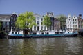 Dutch canal boat and canal house