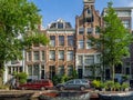 Dutch canal houses in Amsterdam during the day