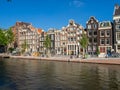 Dutch canal houses in Amsterdam during the day