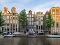 Dutch canal houses in Amsterdam during the day