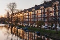 The Dutch capital Amsterdam is in the early morning. The sun rises Royalty Free Stock Photo