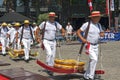Dutch cheese market in Hoorn with working porters