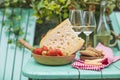 Dutch cheese and strawberries. White wine two glasses. A table with a snack at a party. Vacation. Place for text. Copy space Royalty Free Stock Photo